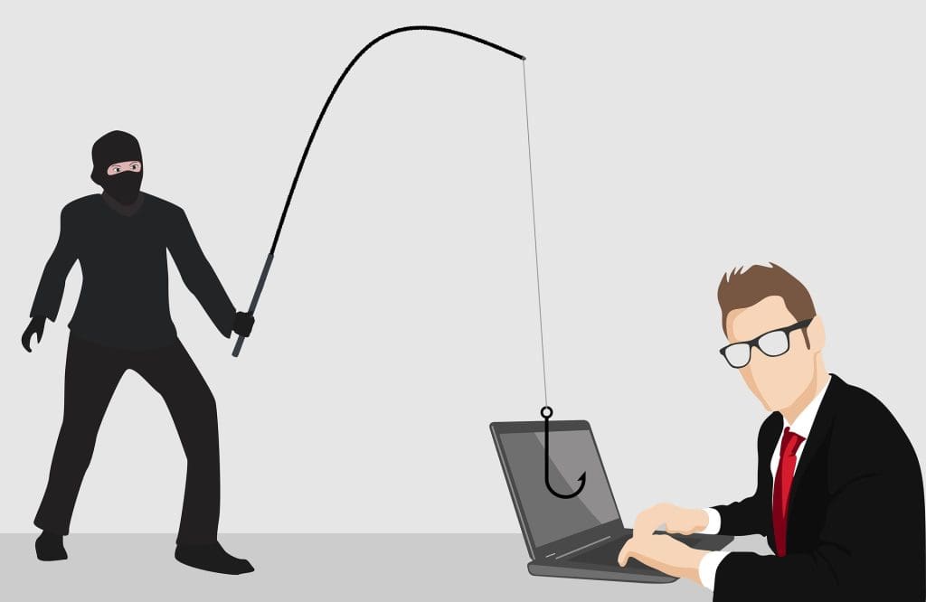 ¿Qué son las quiebras de seguridad? 2 hacker robando información de un computador ajeno